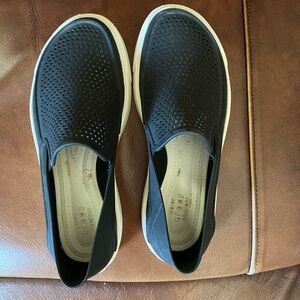 Barely worn slip on shoes, waterproof.